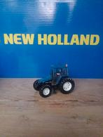 New holland TL80, Hobby en Vrije tijd, Modelauto's | 1:32, Ophalen of Verzenden, Zo goed als nieuw, Tractor of Landbouw, ERTL