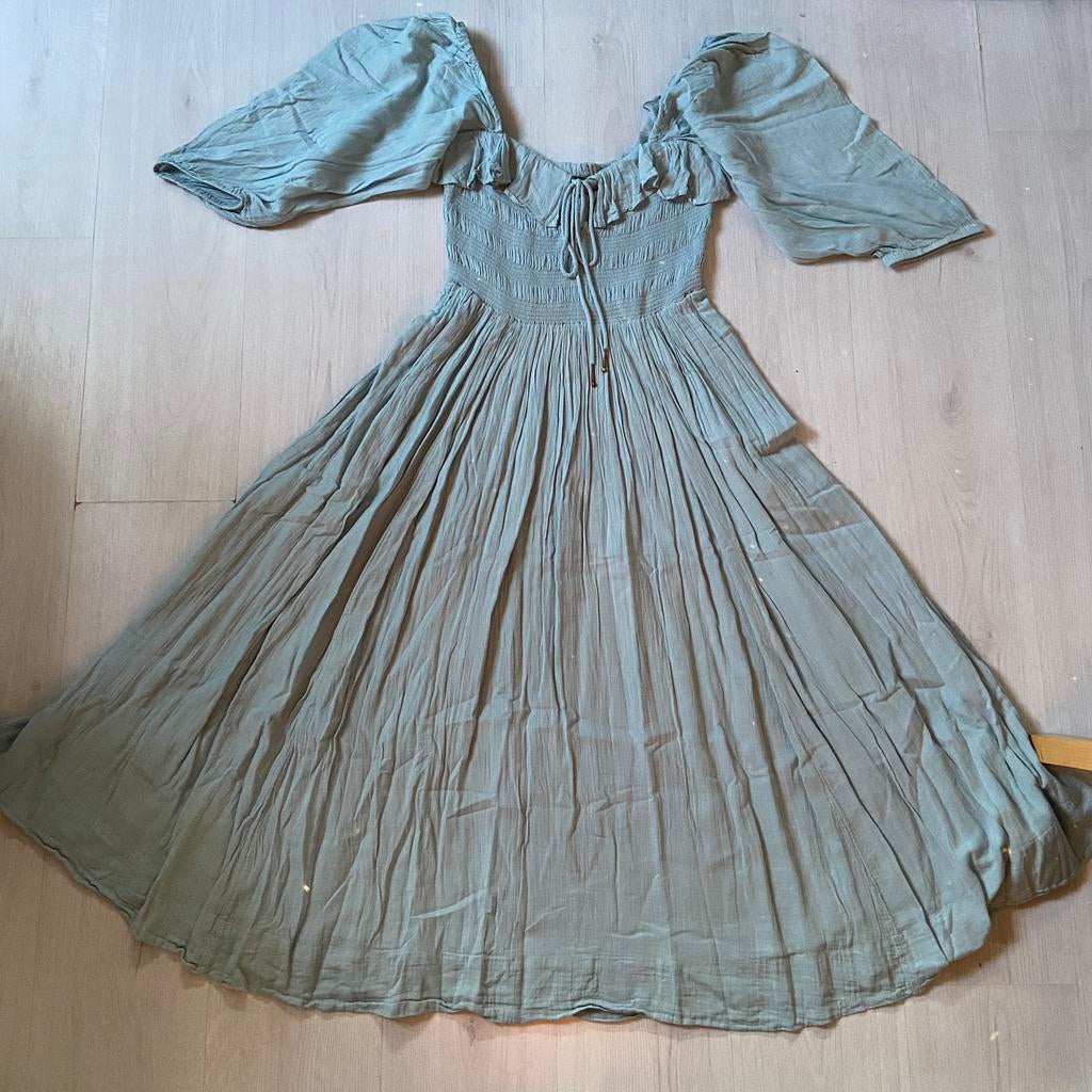 lichtblauwe FREE PEOPLE Oasis jurk mt L met 3/4 mouwen, Verzenden, Blauw, Onder de knie