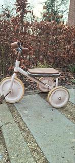 Roze banwood driewieler, Ophalen