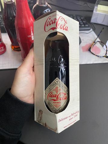 Coca cola flesjes vintage  beschikbaar voor biedingen