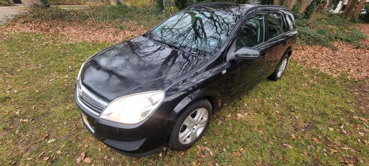 Opel Astra 1.6 16V 85KW St.wgn. 2009 Zwart, Auto's, Opel, Particulier, Astra, ABS, Airbags, Airconditioning, Boordcomputer, Centrale vergrendeling