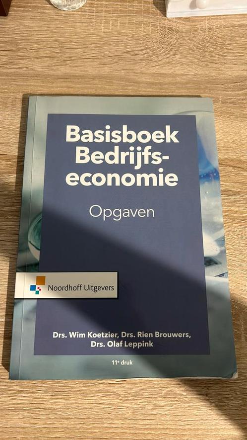 Olaf Leppink -Basisboek bedrijfseconomie -Opgaven - 11e druk, Boeken, Economie, Management en Marketing, Zo goed als nieuw, Economie en Marketing