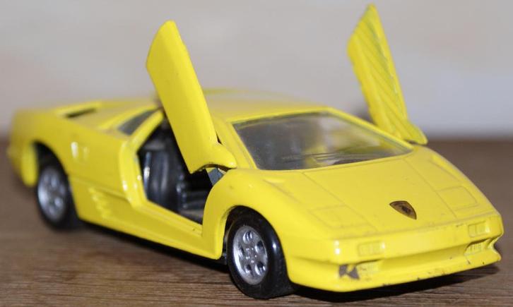 MAISTO (Collectie SHELL) - Lamborghini Diablo geel - 1:40, Hobby en Vrije tijd, Modelauto's | Overige schalen, Zo goed als nieuw