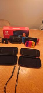 Nintendo Switch + 2 Controllers + 2 Hoezen, Spelcomputers en Games, Ophalen of Verzenden