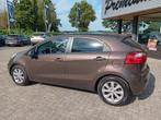Kia Rio 1.4 CVVT 110PK Plus Pack|Automaat|Airco|Nav|Dealeron, Auto's, Kia, Euro 5, Gebruikt, Zwart, 4 cilinders