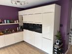 Moderne witte hoogglans hoekkeuken /ATAG&QuookerGEDEMONTEERD