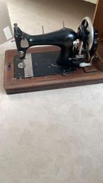 Antieke Naaimachine, Ophalen