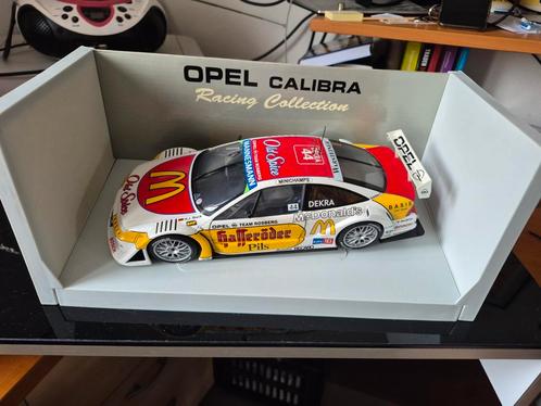 DTM Opel Calibra 1:18 1996 Team Rosberg Rijder H.J. Stuck 2, Hobby en Vrije tijd, Modelauto's | 1:18, Zo goed als nieuw, Auto