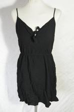 Zwarte mini-jurk.Mt 44.Merk Divided, Kleding | Dames, Jurken, Maat 42/44 (L), Ophalen of Verzenden, Zo goed als nieuw, Zwart