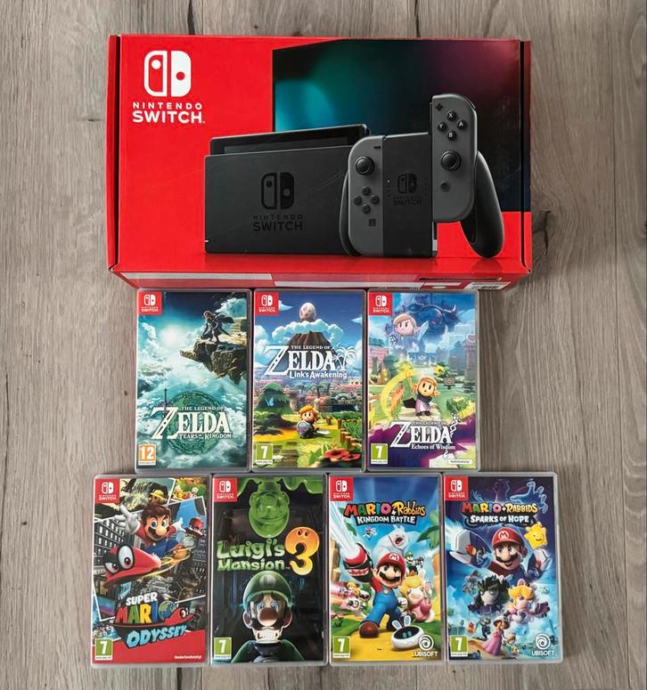 Nintendo Switch V2 - Met diverse spellen, Spelcomputers en Games, Games | Nintendo Switch, Gebruikt, Avontuur en Actie, 2 spelers
