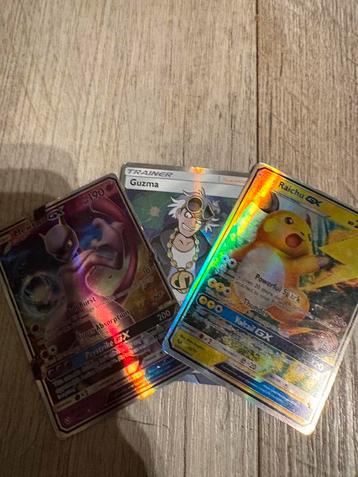 Mewtwo GX waarde 6.00 ,guzma trainer waarde 20.00,raichu GX  beschikbaar voor biedingen