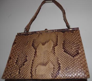 slangenleren tas beschikbaar voor biedingen