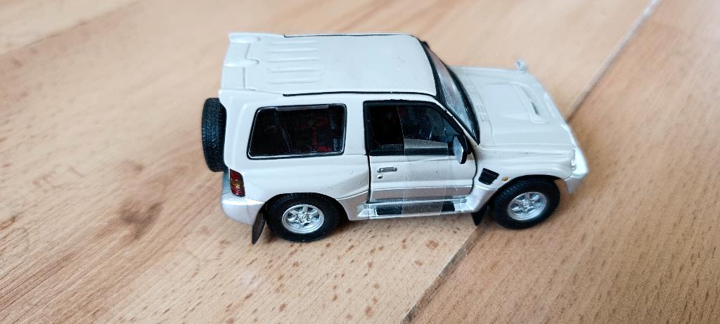 Mitsubishi Pajero Evolution 1:43 zonder ovp, Ophalen of Verzenden, Zo goed als nieuw, Auto, Overige merken