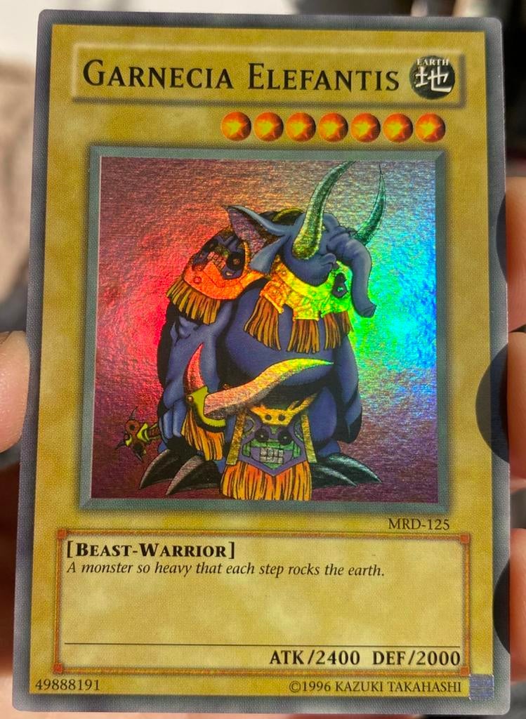 Yu-Gi-Oh! Garnecia Elefantis MRD Heavy US Faded Misprint, Ophalen of Verzenden, Gebruikt, Losse kaart, Foil