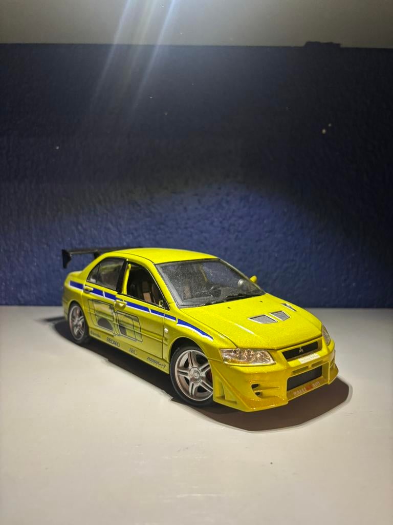 ERTL 1:18 Evo f&f, Hobby en Vrije tijd, Modelauto's | 1:18, Ophalen of Verzenden, Gebruikt, Auto