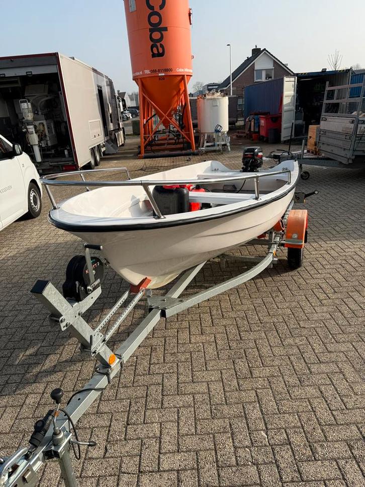 Elan T401 met 9,9 en trailer compleet, Watersport en Boten, Vis- en Consoleboten, Zo goed als nieuw, Tot 10 pk, 3 tot 6 meter