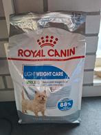 ONGEOPEND ZAK HONDENBROKJES, Ophalen