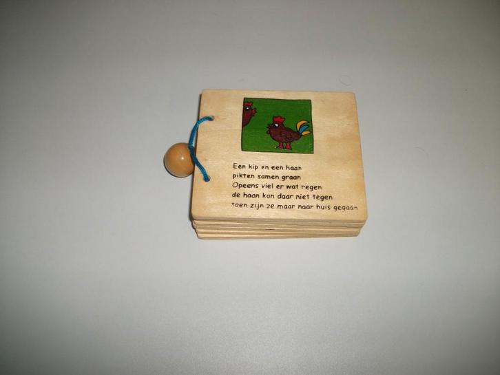 Hout boekje vrolijke versjes, Kinderen en Baby's, Speelgoed | Houten speelgoed, Gebruikt, Ophalen of Verzenden