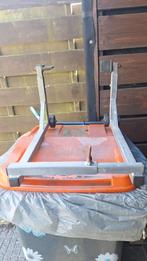 Motorfiets standaard, Ophalen