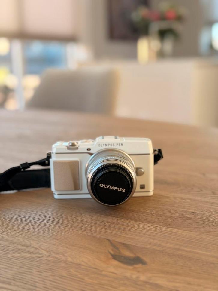 Olympus pen E-p5 + Olympus M.Zuiko 14-42mm f/3.5-5.6 II R, Audio, Tv en Foto, Fotocamera's Analoog, Zo goed als nieuw, Compact