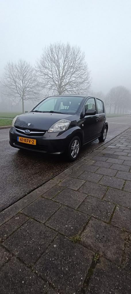 Subaru Justy 1.0 2010 Zwart, Auto's, Subaru, Voorwielaandrijving, Justy, Stof, Zwart