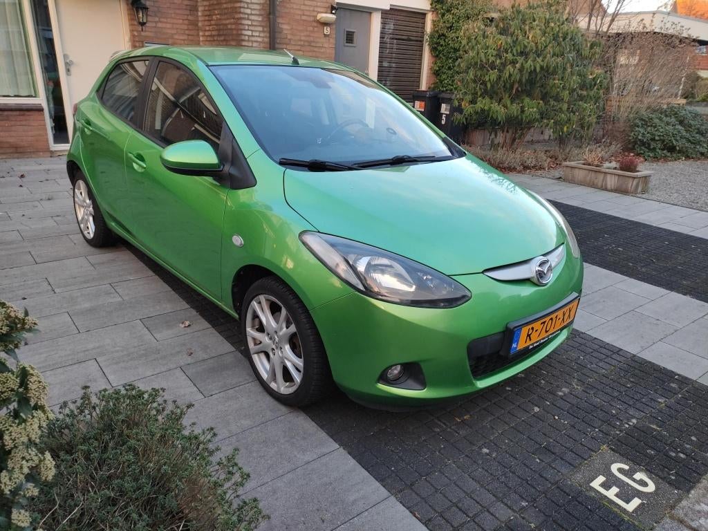 Mazda 2 Airco - stoelverwarming - 5 deurs, Auto's, Mazda, Voorwielaandrijving, Stof, 4 cilinders, 1349 cc