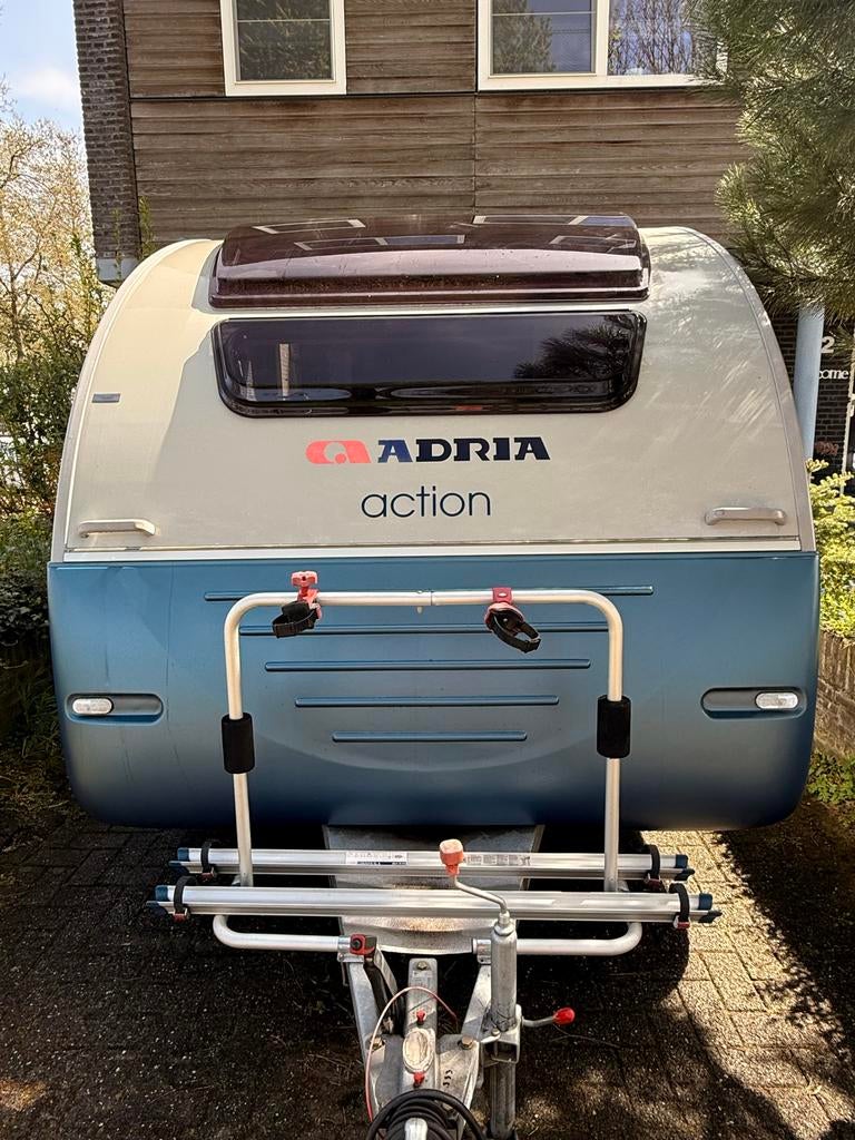 Adria Action 361LH april 2014 met complete uitrusting, Schokbreker, Rondzit, Omvormbare zithoek, Bedrijf