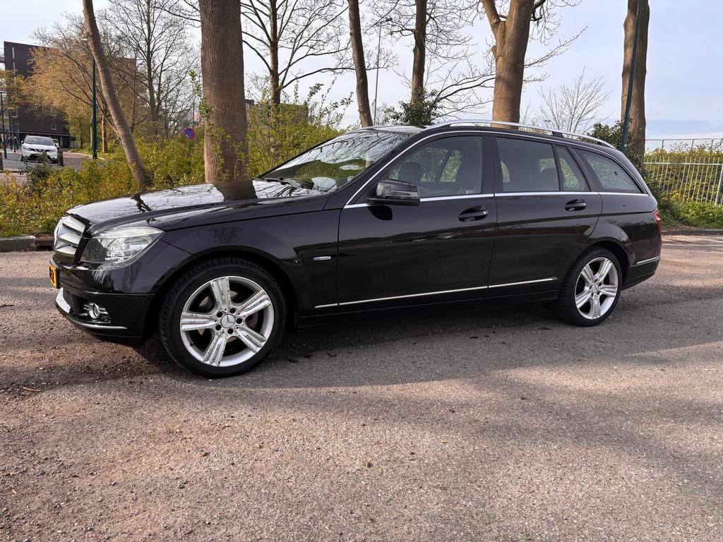 Mercedes-Benz C-Klasse 1.6 C180 Kompr. Estate 2011 Zwart, Auto's, Mercedes-Benz, Achterwielaandrijving, Zwart, Leder en Stof, Zwart
