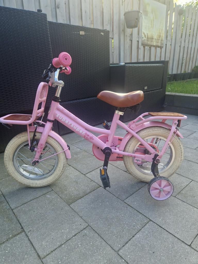 Roze 12 inch meisjes fiets, Fietsen en Brommers, Fietsen | Kinderfietsjes, Ophalen, Terugtraprem, Zijwieltjes, Gebruikt