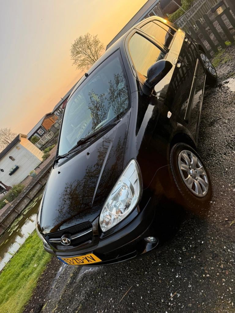 Hyundai Getz 1.4 5DRS 2008 Zwart, Auto's, Hyundai, Voorwielaandrijving, 40 €/maand, Zwart, 4 cilinders