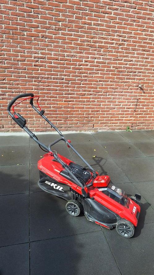Skil grasmaaier incl accu's en snellader, Tuin en Terras, Grasmaaiers, Gebruikt, Ophalen
