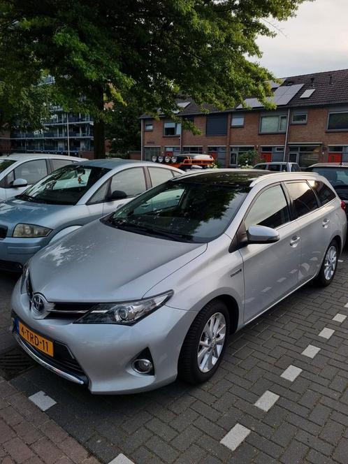 Toyota Auris 1.8 Hybrid NIEUW APK Touring  CVT 2014 Grijs, Auto's, Toyota, Particulier, Auris, Volledig hybride, A, Origineel Nederlands