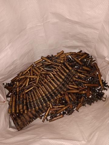 Tas met lege hulzen zonder punt en een band onklaar  beschikbaar voor biedingen