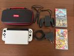 Nintendo Switch OLED + 2 Games + Reistas, Spelcomputers en Games, Switch OLED, Met games, Ophalen of Verzenden, Zo goed als nieuw