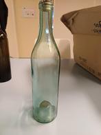 Oude wijnfles lichtblauw, Ophalen