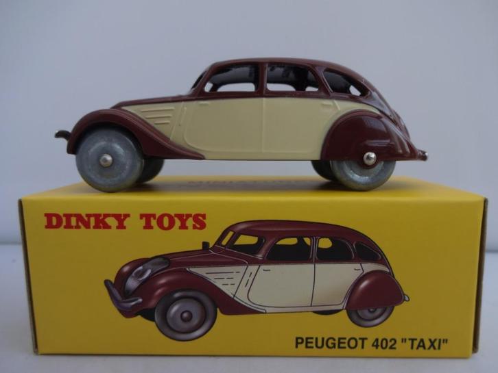 Peugeot 402 TAXI geel/bruin nr: 24L van Dinky Toys 1/43, Hobby en Vrije tijd, Modelauto's | 1:43, Nieuw, Auto, Dinky Toys, Ophalen of Verzenden