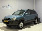Hyundai Tucson 2.0i Dynamic // AIRCO // CRUISE // NIEUWE APK, Auto's, Stof, Zwart, 4 cilinders, Blauw