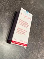 Nieuw Clarins sample bodylotion lichaamsverzorging, Verzenden, Nieuw, Bodylotion, Crème of Olie
