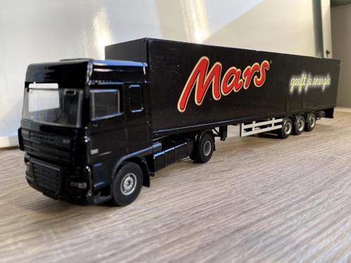 Vrachtwagen model Mars - geeft je energie, zwart, Hobby en Vrije tijd, Modelauto's | Overige schalen, Gebruikt, Bus of Vrachtwagen