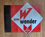 Prachtig emaille uithangbord Piles Wonder 60x45cm, Ophalen of Verzenden, Gebruikt, Reclamebord