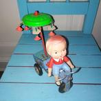 Blikken driewielertje met jongetje met paraplu opwindbaar, Antiek en Kunst, Antiek | Speelgoed, Ophalen