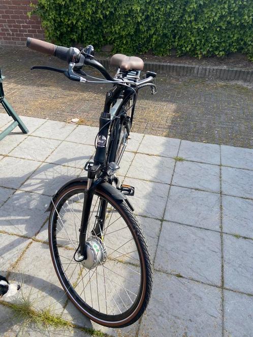 Heren fiets elektrisch te koop, Fietsen en Brommers, Elektrische fietsen, Zo goed als nieuw, Overige merken, 50 km per accu of meer