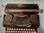 Olympia typemaschine (oud), Ophalen