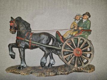 Bas-reliëf - paarden en koets

 beschikbaar voor biedingen