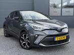 Toyota C-HR 2.0 Hybrid Bi-Tone Dealer Onderhouden,Camera,Tre, Auto's, Toyota, Euro 6, 4 cilinders, Leder en Stof, Bedrijf