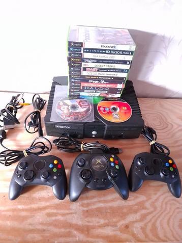 xbox console met controllers en games beschikbaar voor biedingen