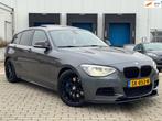 BMW 1-serie M135i High Executive 412PK AUT RWD H&K Dak 5D, Auto's, Achterwielaandrijving, Gebruikt, Euro 6, 320 pk