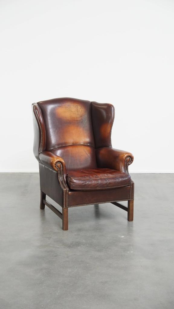 Engelse stijl schapenleren oorfauteuil met veel karakter, Huis en Inrichting, Fauteuils, Gebruikt, Leer, 75 tot 100 cm, 75 tot 100 cm