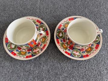 2 koppen en schotels (Taitú) beschikbaar voor biedingen