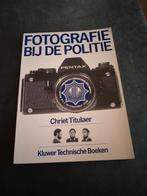 Fotografie bij de Politie - Chriet Titulaer, Ophalen